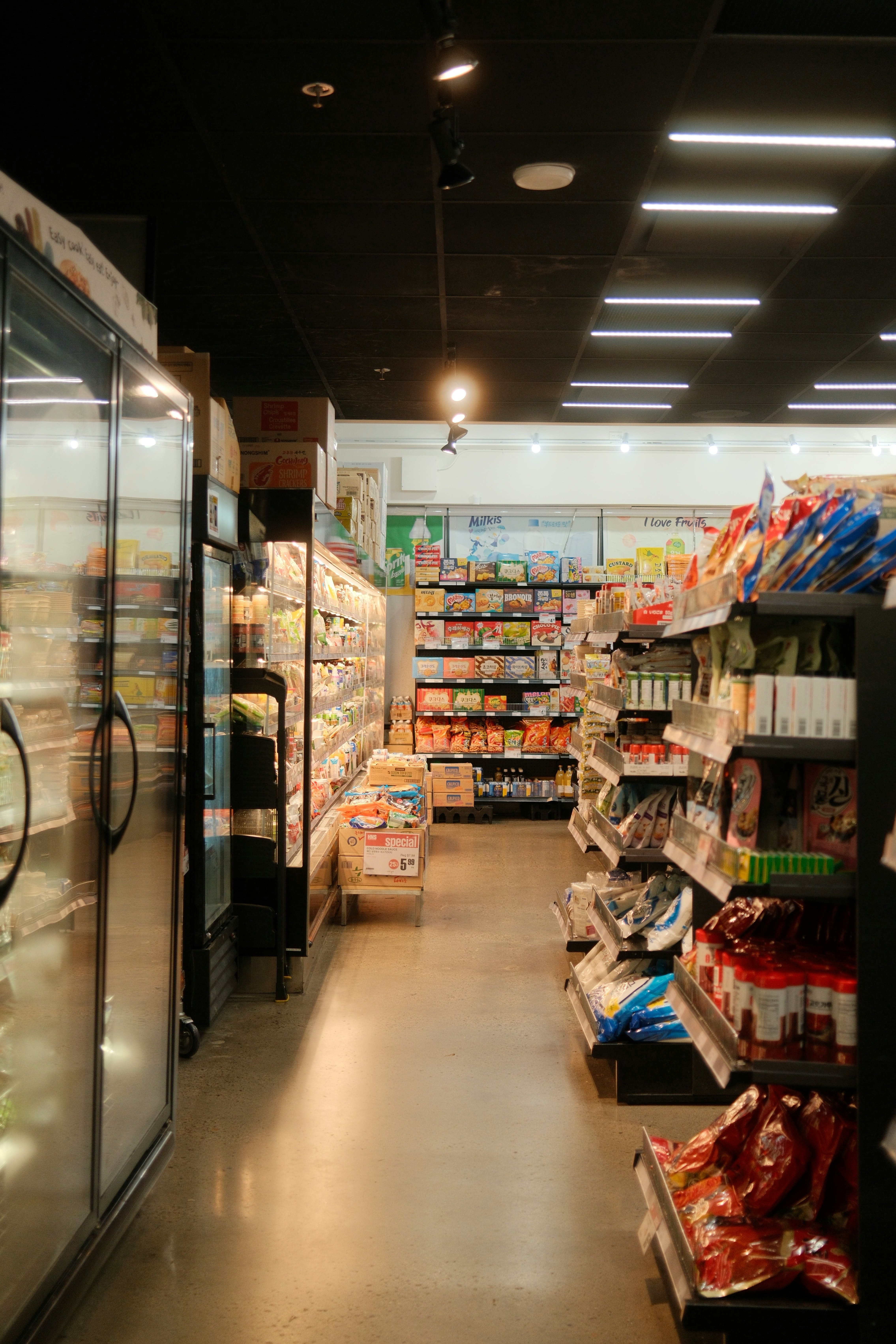 Eastern European grocery store interior with rows of products, Balkan foods, clean and well-stocked